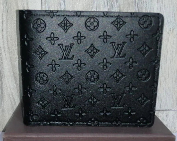 Louis Vuitton Wallet, possibly the Cléa Wallet or the Victorine Wallet